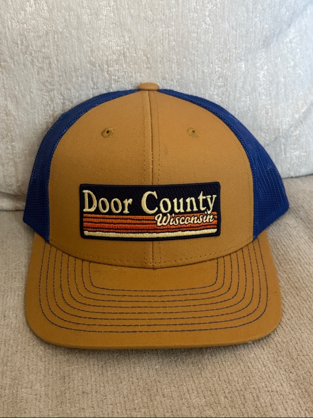 Door County Wisconsin Trucker Hat in Mustard and Royal Blue